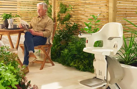 The point of it: the garden stays part of the house, in every season the lift is certified for.