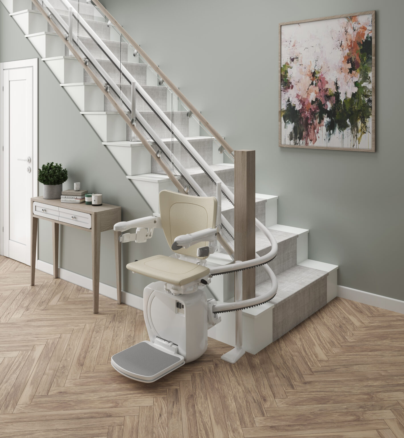 Handicare 4000 curved stairlift with an ivory Style seat parked at the foot of a staircase, its white twin rail curving out from the bottom step across a herringbone wood floor