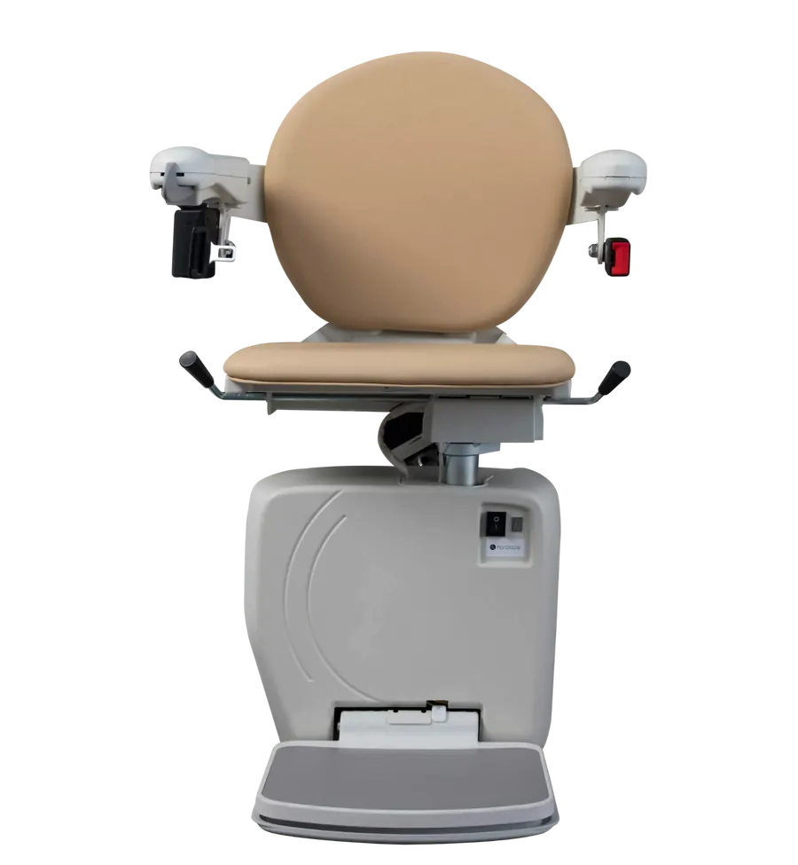 Handicare 4000 Simplicity seat in sand leatherette, front view, with manual fold levers either side of the seat pad