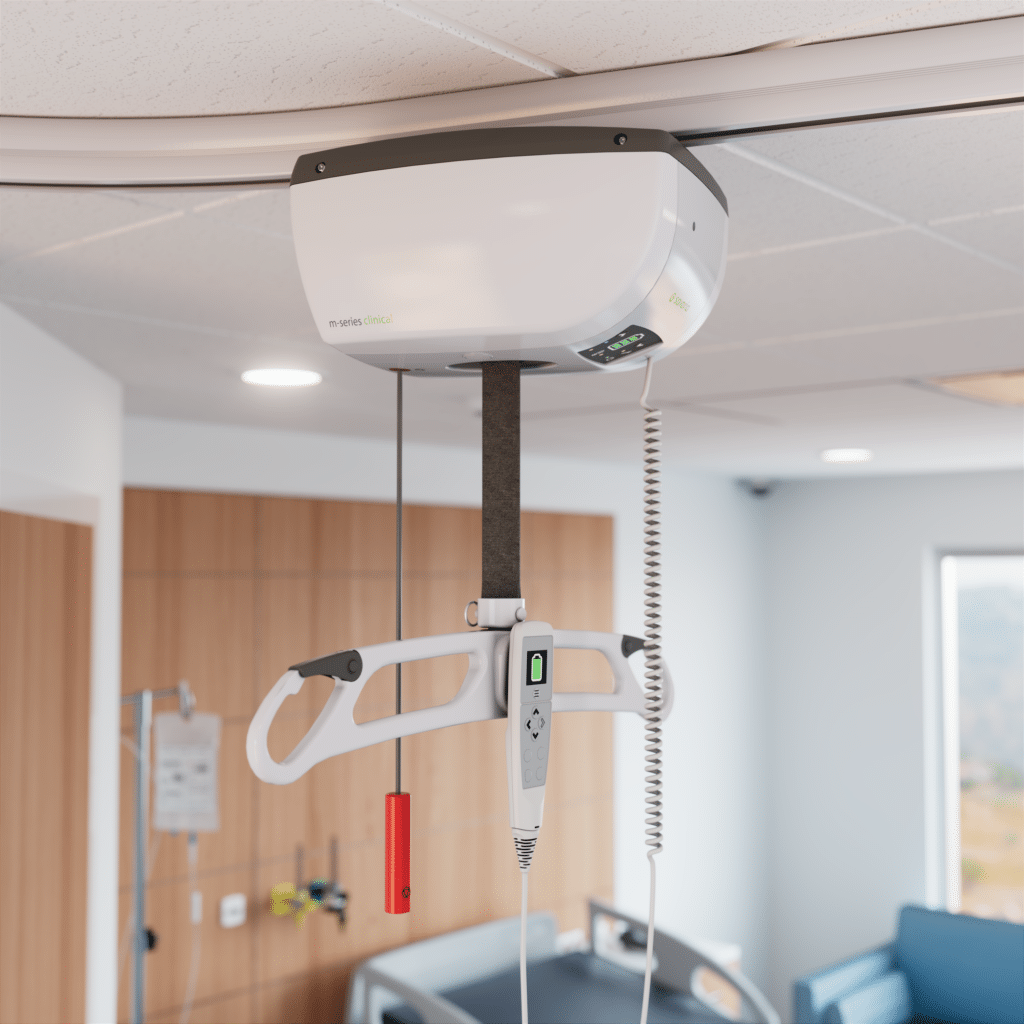 Ceiling track lift installed above a bed