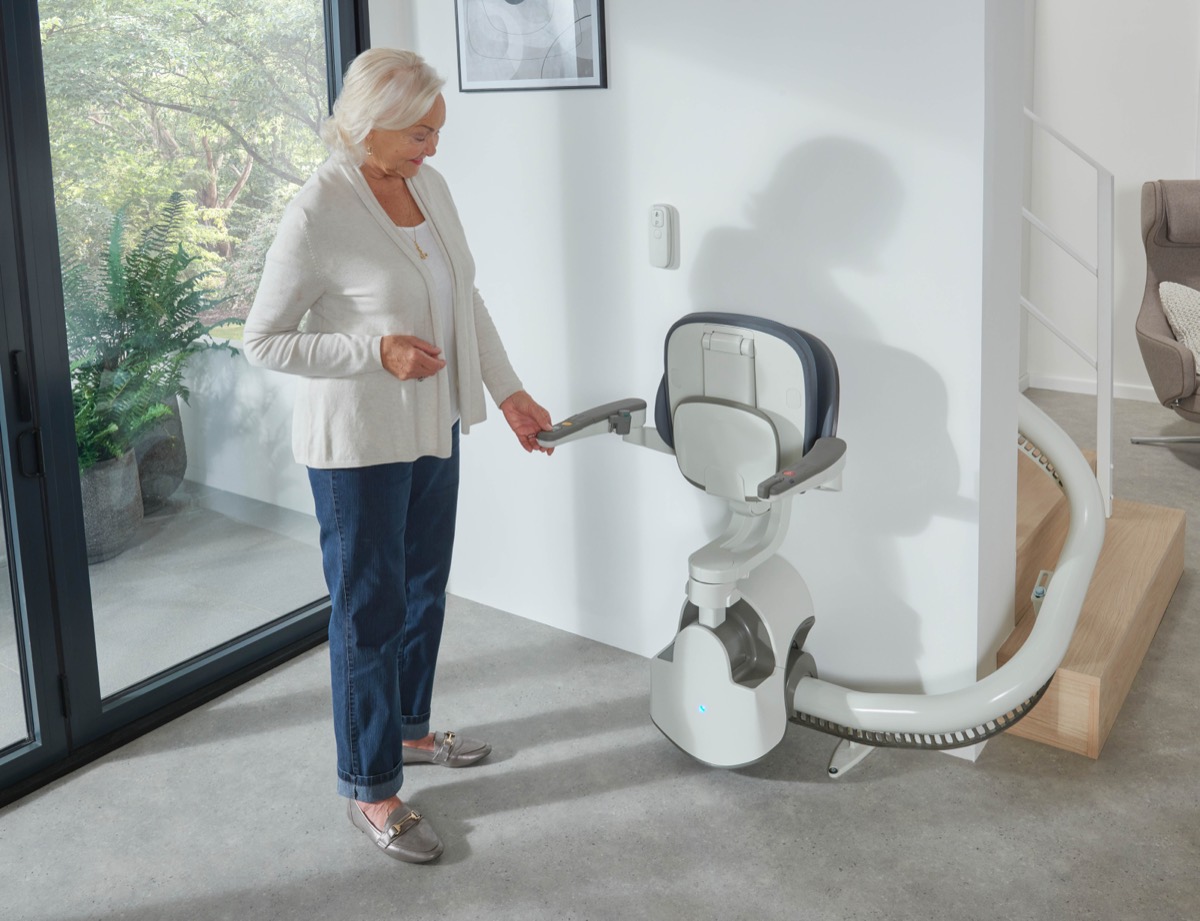 A woman stepping onto an Access Flow X, seat swivelled towards her