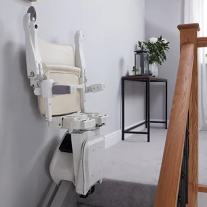 stairlift folded flat against the wall