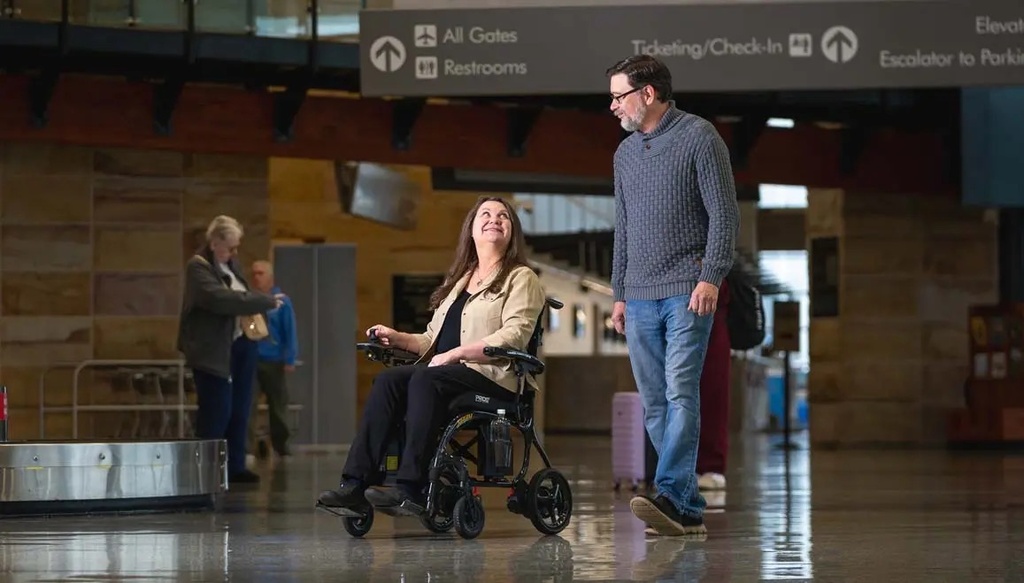 Pride Jazzy Carbon 27X Power Wheelchair - lifestyle view