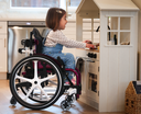 Axiom PXSP kids cushion in use, lifestyle view