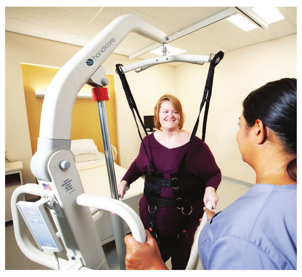 Handicare FGA-700 carry bar in use during gait and ambulation training