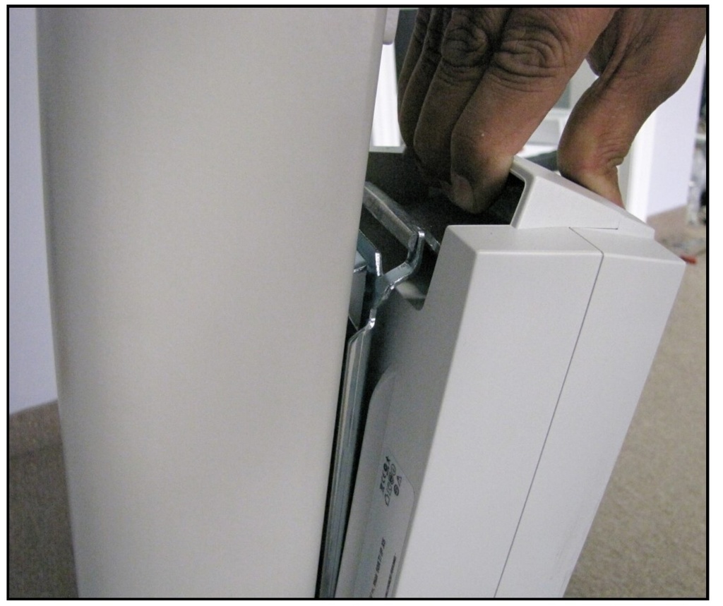Sliding the BAJ1 battery box onto the bracket above the control box