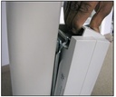 Sliding the BAJ1 battery box onto the bracket above the control box
