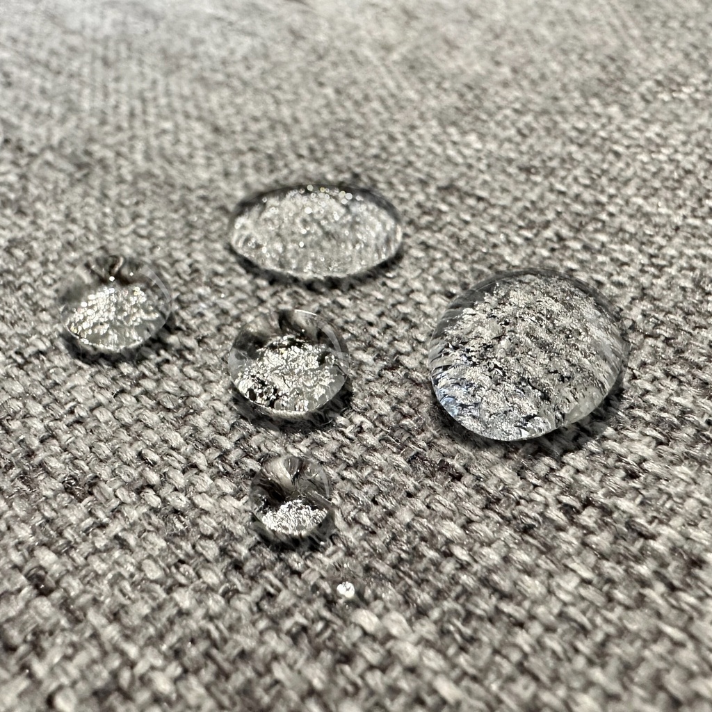 Water-resistant pale grey cover on an Orthex Sophia homecare bed