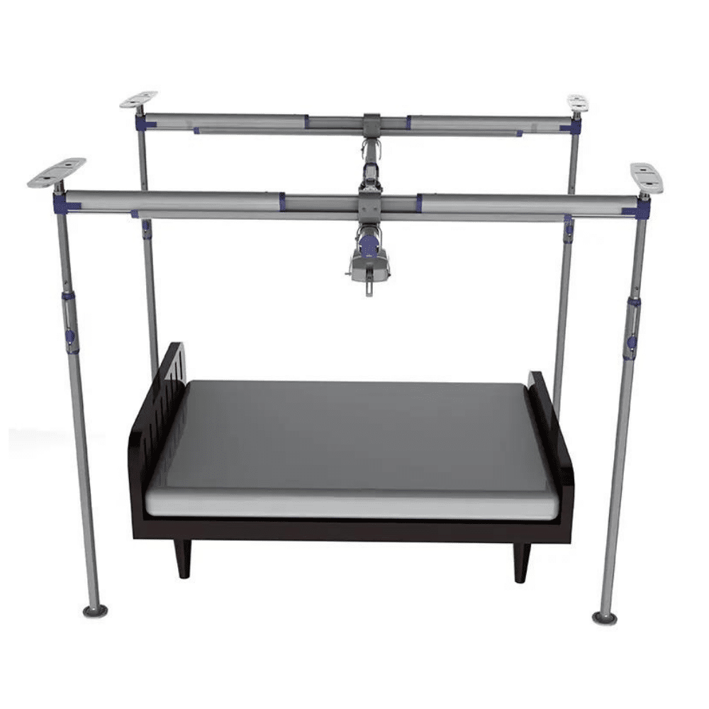 Two parallel ceiling rails with a traversing rail between them over a bed